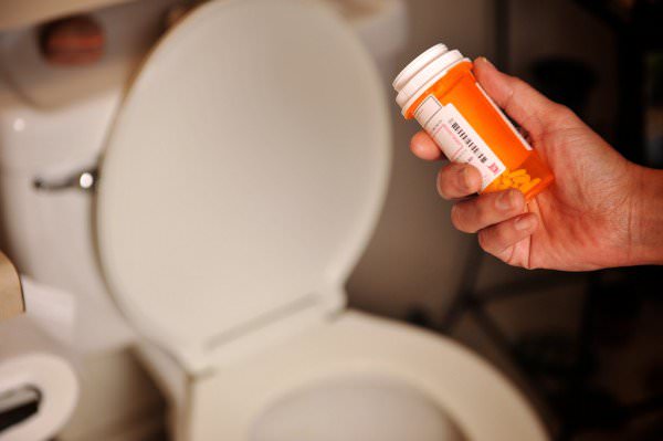 It basically means flushing out your system, although this picture is misleading. You should absolutely never flush your drugs down the toilet. (WikiHow)