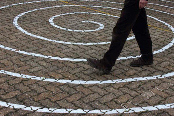 One common method is practiced while in a single location, with patterns drawn on the ground. (Red On/ShutterStock)