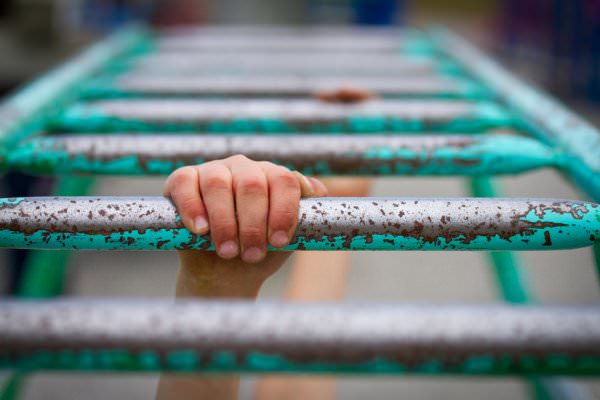 The addict may sometimes feel as if they are barely hanging on. Without a proper relapse prevention strategy in place, it will be all too easy to let go and fall. (Dreamstime)