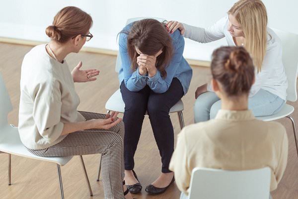 It’s always a bit easier to suffer the hard times when others are there to lend support. (Photographee.eu/Shutterstock)