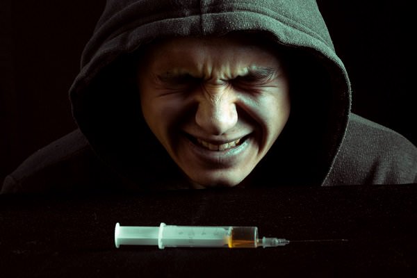 We know the disease model to be true because we know what it is like to crave something we no longer enjoy. But when a person is in the throes of withdrawal, it can be difficult not to give in. (Evdokimov Maxim/Shutterstock)