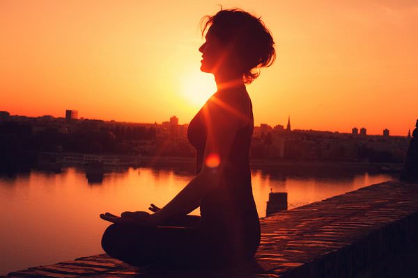 Many of us begin our day with a morning meditation, so as to ensure our spiritual needs are met from the moment we wake. (djile/Shutterstock)