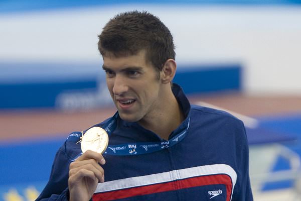 We all know Michael Phelps as a gold medalist. But over the years, he’s made headlines for a few less prestigious reasons as well. (Mitch Gunn/Shutterstock)