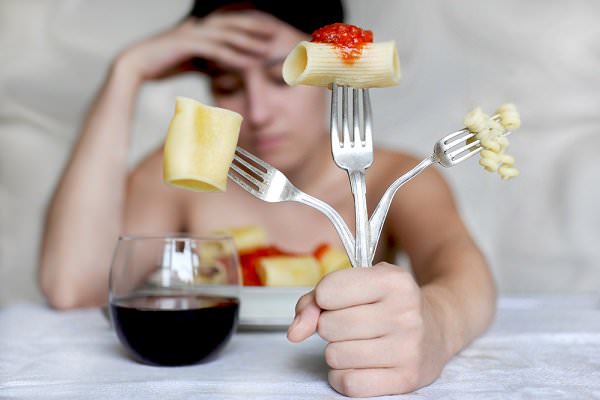 Not only are eating disorders a form of addiction, but they often go hand-in-hand with drinking and drug abuse. (Ursula Ferrara/Shutterstock)