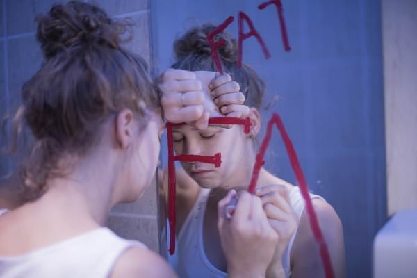 Many eating disorders arise out of a devastating mixture of body dysmorphic disorder and depression. (Photographee.eu/Shutterstock)