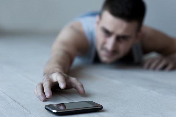 Some addicts and alcoholics wish to receive help, but have trouble picking up the phone and asking for it. But we can help many who are so afflicted, if we are only willing to try. (g-stockstudio/Shutterstock)