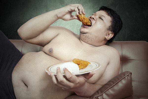 Going by the classic definition, the food is not the problem in this image. Instead, the problem is the lack of other people. (Creativa Images/Shutterstock)