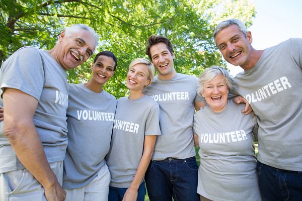 Not only will service work help us to break the cycle of greed, but it may also put an end to our sense of isolation. (wavebreakmedia/Shutterstock)