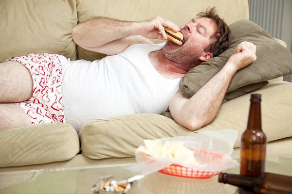 Once your addiction has lasted long enough, you may find yourself doing nothing but drinking, eating, or abusing drugs all day. (Lisa F. Young/Shutterstock)