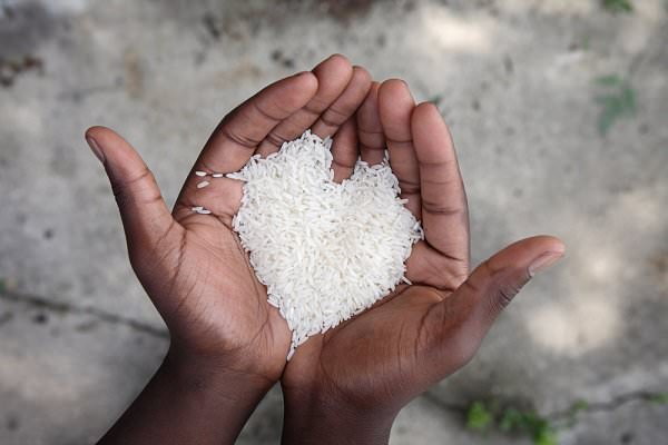 No matter how much we may want more out of life, there are those who would give anything for just a handful of rice. (Suzanne Tucker/Shutterstock)