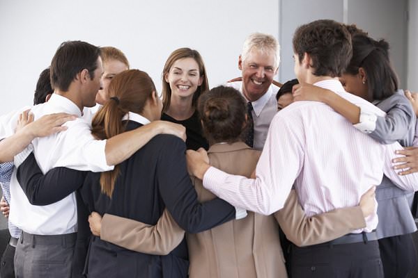 Whether you take a service position or not, definitely consider attending business meetings for your group. It adds to the general sense of camaraderie in AA. (Monkey Business Images/Shutterstock)
