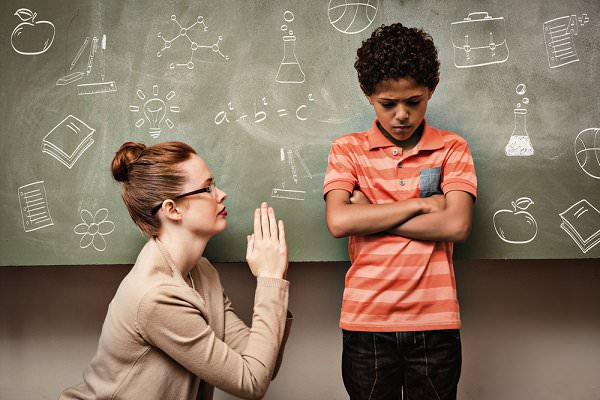 A teacher dealing with a troublesome student cannot lose her temper. The same is true of addicts who must make amends to people they resent. (wavebreakmedia/Shutterstock)