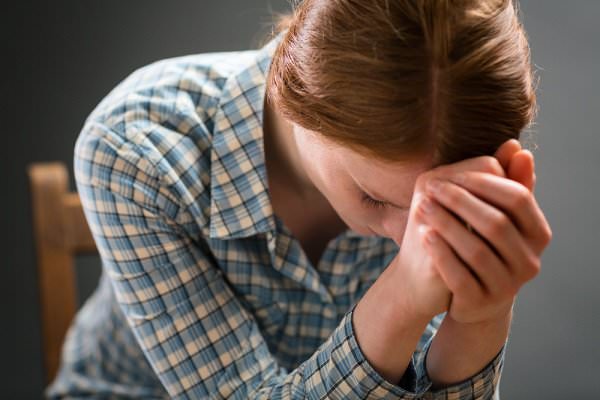 Prayer is a fairly common use for the moment of silence. (ptnphoto/Shutterstock)