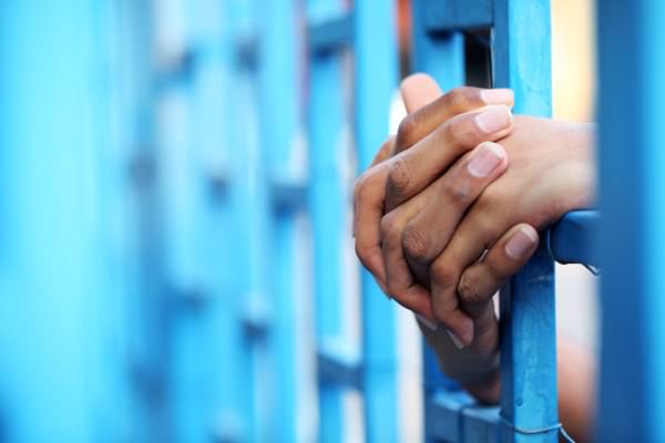 Putting addicts behind bars will do little to solve the underlying issues. There needs to be a push for treatment instead of prison. (sakhorn/Shutterstock)