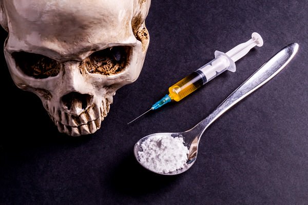 Rising rates of heroin addiction and overdose death may spur legislators to make some much needed changes. (EsHanPhot/Shutterstock)