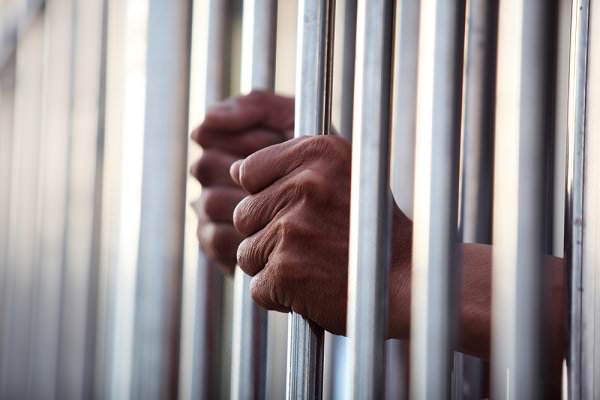 Prison has long been believed to be a deterrent to drug-related crimes, yet addiction rates continue to climb. (sakhorn/Shutterstock)