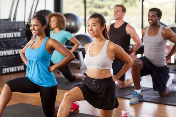 If you want to get even more from your exercise, try taking a class where you can meet other happy people. (Lee Torrens/Shutterstock)