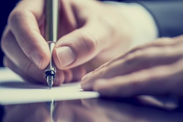 We can’t always be so quick to let someone write us a check. (Gajus/Shutterstock)