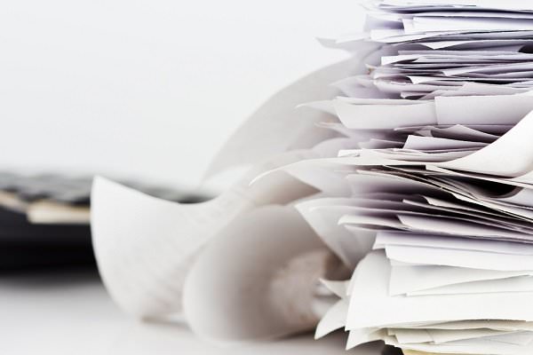 Without delegation of responsibilities, the Board’s office would be piled high with paperwork and nothing would ever get done. (patpitchaya/Shutterstock)