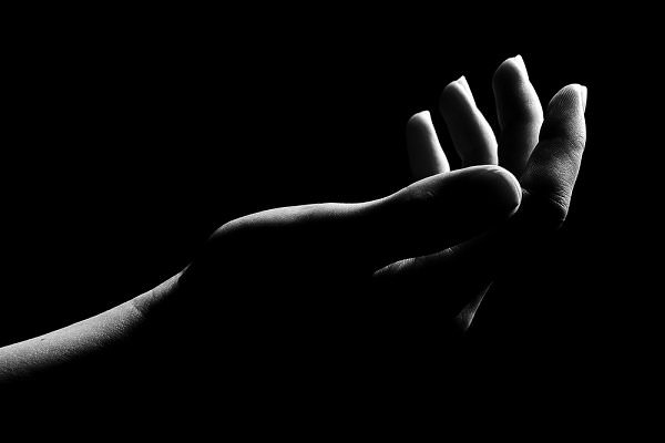 To apply the Eighth Tradition to our own lives, we must learn the benefit of asking for help. (Aleksandr Petrunovskyi/Shutterstock)