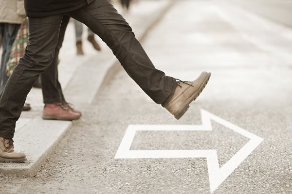 No matter what we’ve done in the past, we must move forward with one foot in front of the other. (connel/Shutterstock)