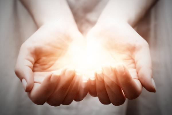 Begin by reaching out to someone in need and demonstrating the light you have to offer. (PHOTOCREO Michal Bednarek/Shutterstock)