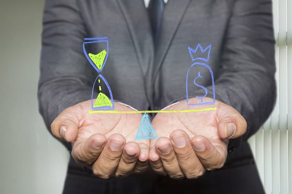 Traditionally, opportunity cost might involve time or money. But for our purposes, we might view cost in terms of our principles, our relationships, and our health. (prince_apple/Shutterstock)